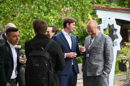 Between meetings in the courtyard